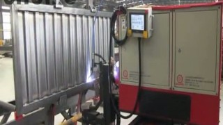 Automatic corrugated plate welding machine