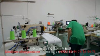 Автоматическая швейная машина для подгиба низа футболки.