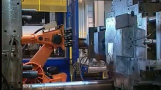 KUKA robots at die-casting machine for vehicle transmission - Робототехника