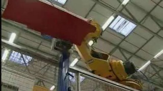 Handling of Smart bumpers at a plastics processing machine with a KUKA robot - Роботы